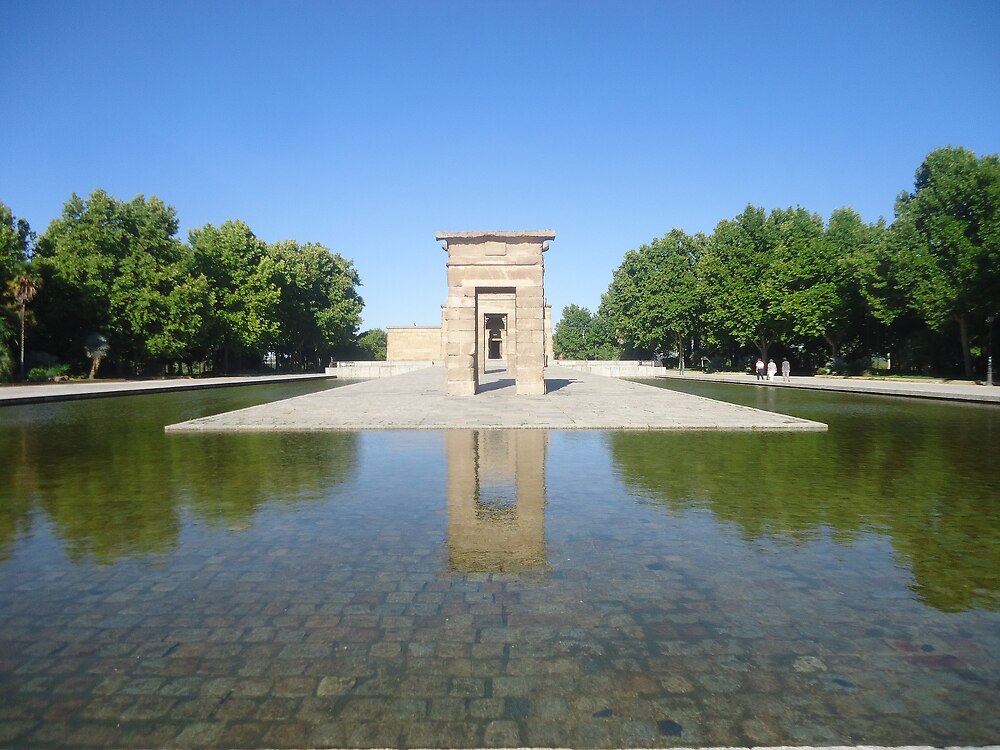 Temple of Debod, in a reflecting pool of the Parque del Oeste park, Madrid, Spain.