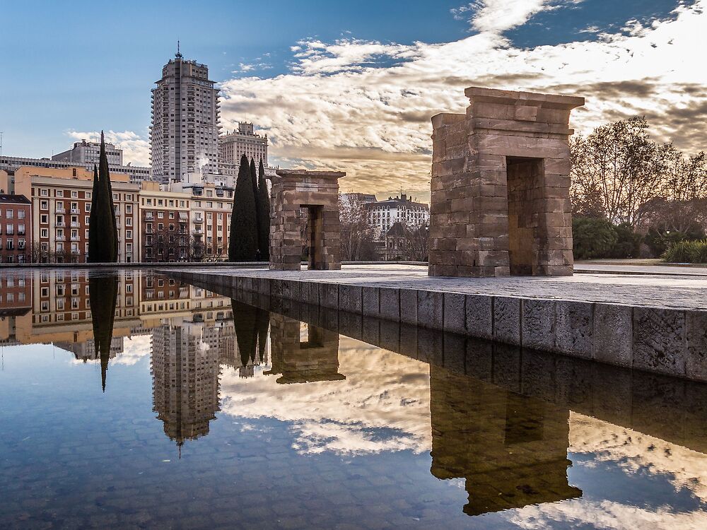 Temple of Debod, in a reflecting pool of the Parque del Oeste park, Madrid, Spain.